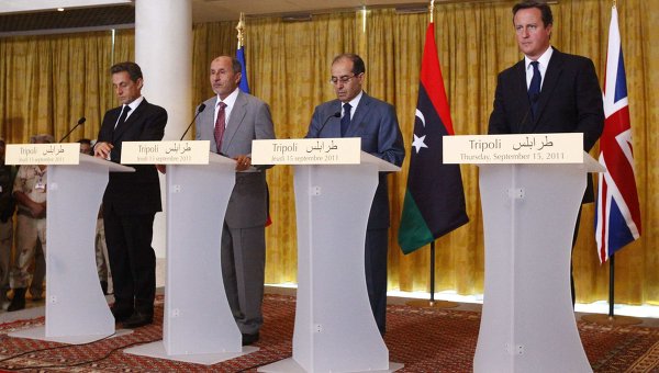 Các nhà lãnh đạo Anh, Pháp và NTC tại cuộc gặp. Ảnh: Reuters