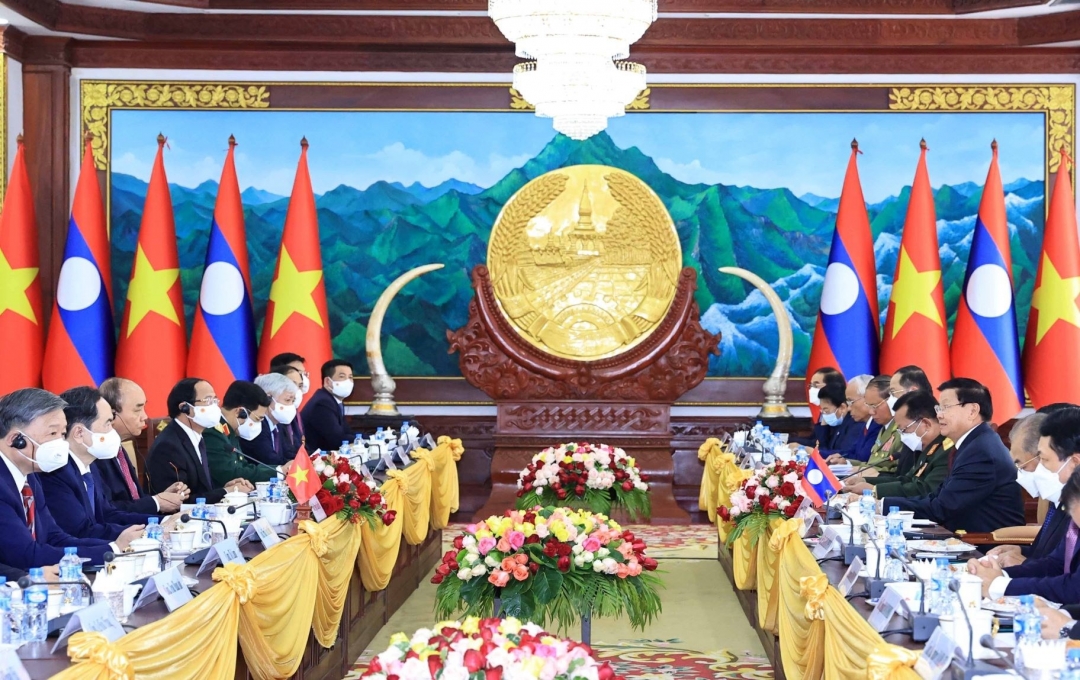 Chủ tịch nước Nguyễn Xuân Phúc hội đàm với Tổng Bí thư, Chủ tịch nước Lào Thongloun Sisoulith. (Ảnh: TTXVN)