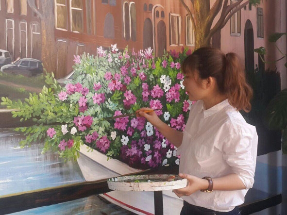 Kim Anh Art hoàn thành bức tranh tường 3D. (Ảnh nhân vật cung cấp)